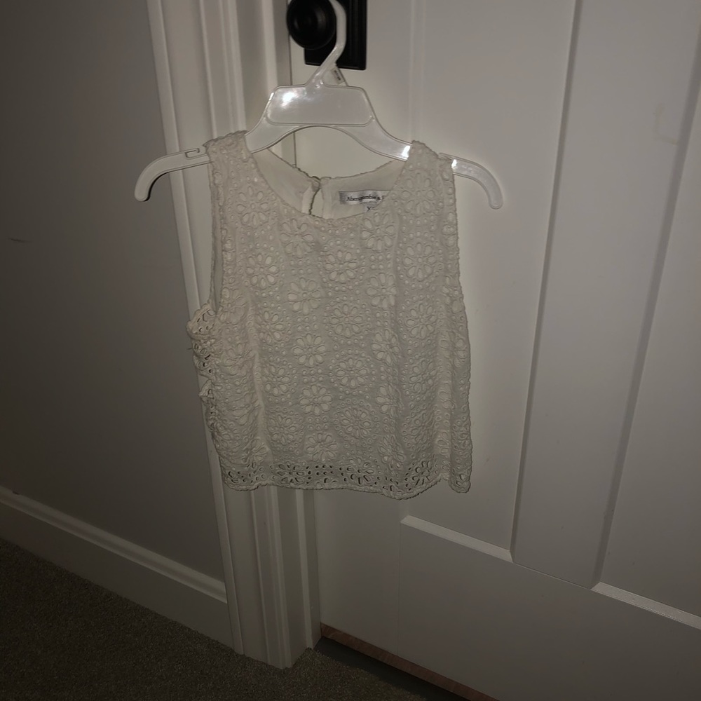 two white lace crop tops